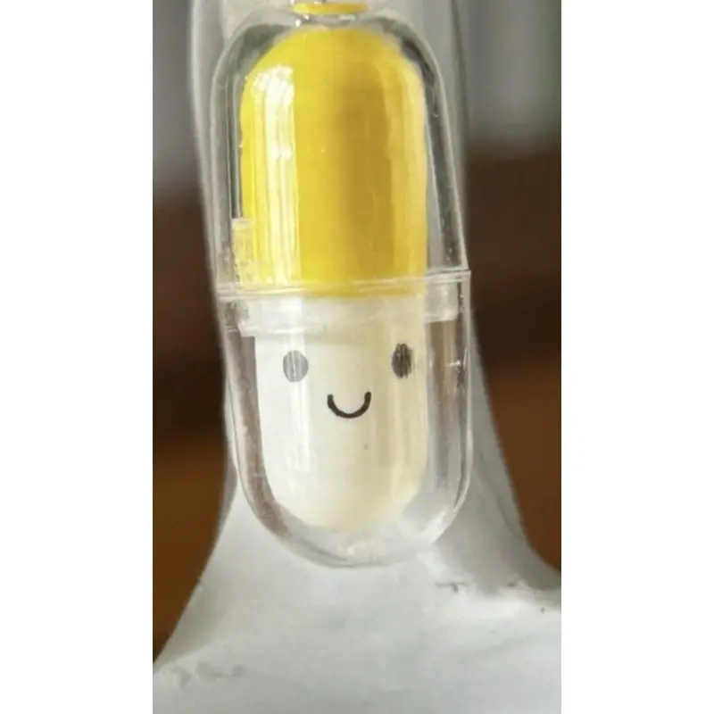 Porte-clé - Capsule en plastique