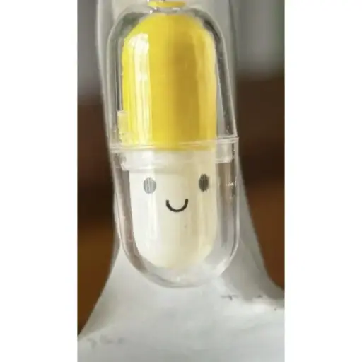 Porte-clé - Capsule en plastique